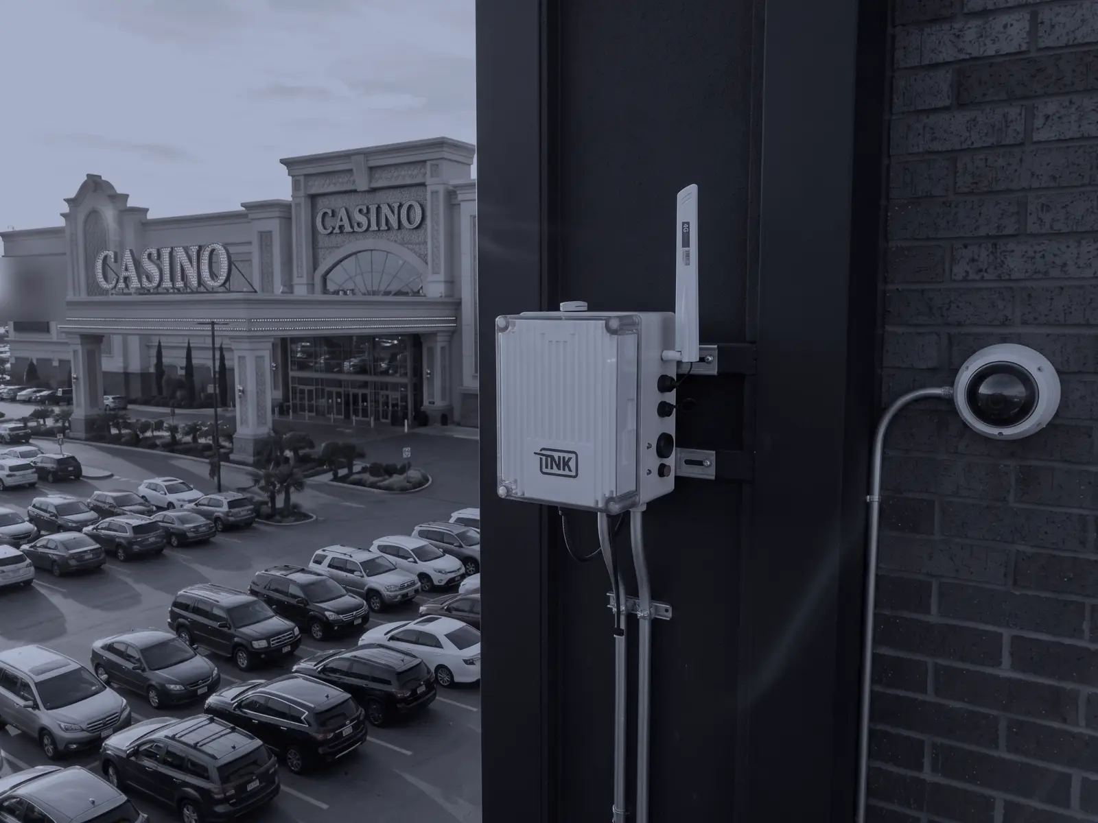 CarDefense fixed sensor on a wall above the parking lot of a casino